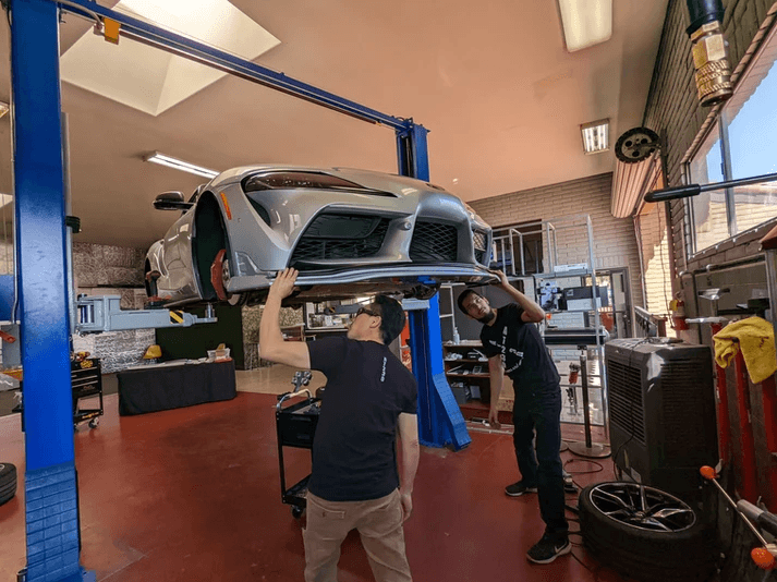 Mechanic working on a car engine
